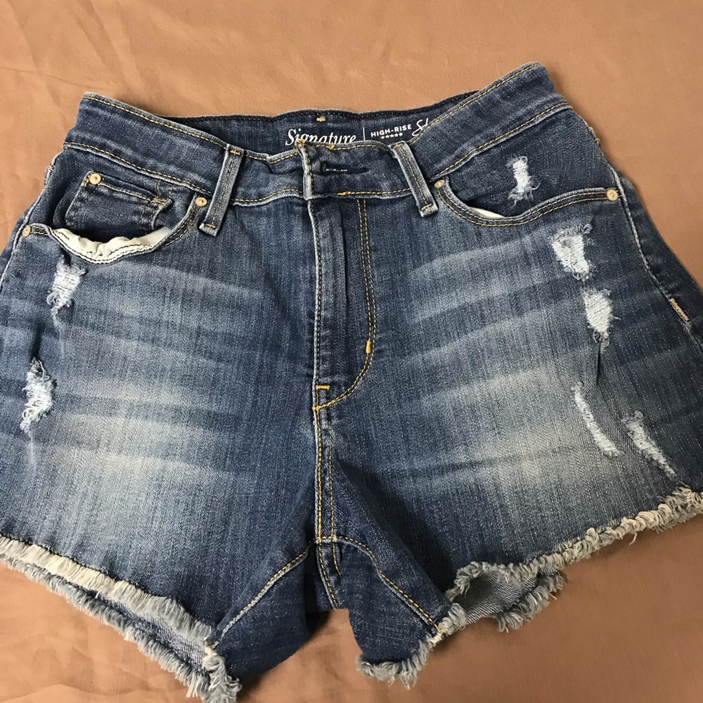 Levi’s high waist distressed cutoffs Sz 2